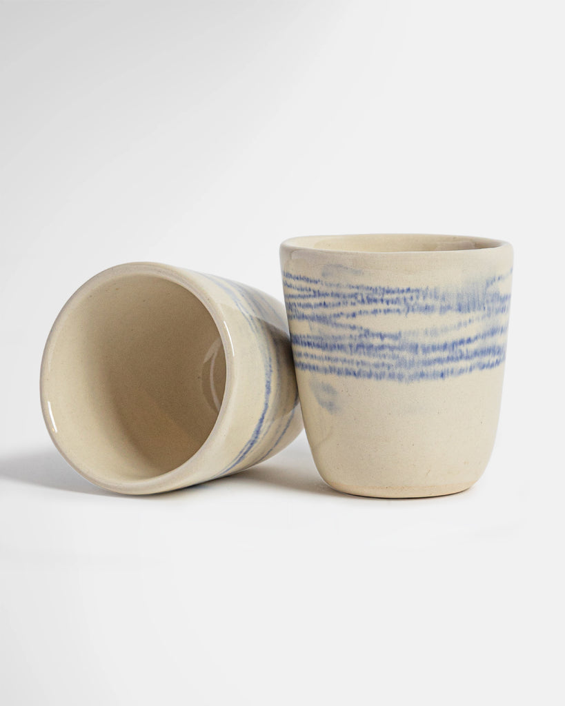 Dallas Hair Club Cappuccino Cup by Marcello Andres