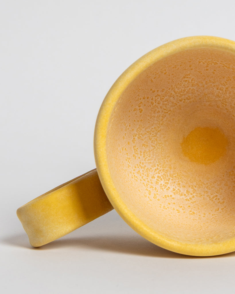 St. Mark's Yellow Ceramic Casa Mug by Marcello Andres in Dallas, Texas